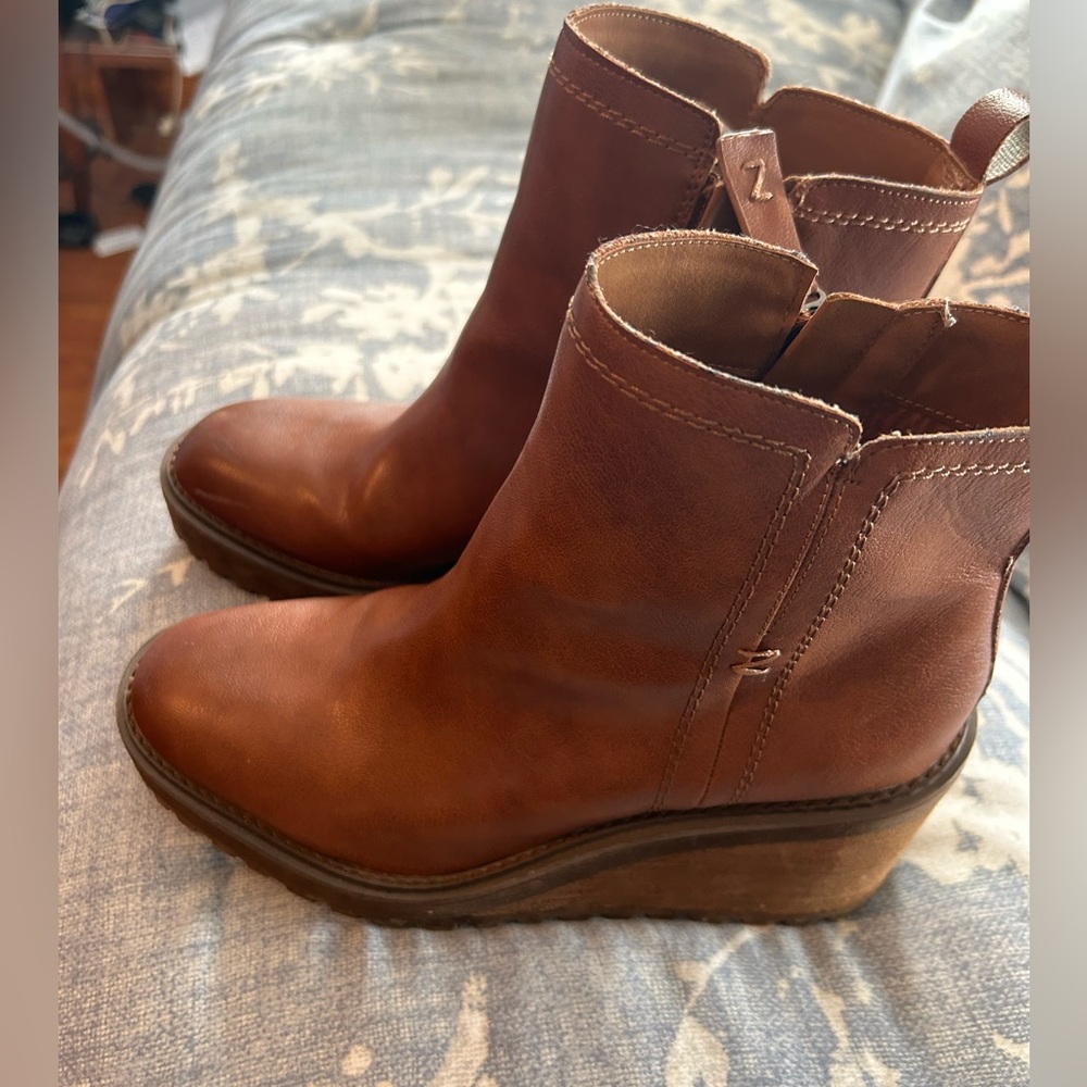Women’s Zodiac wedge booties.